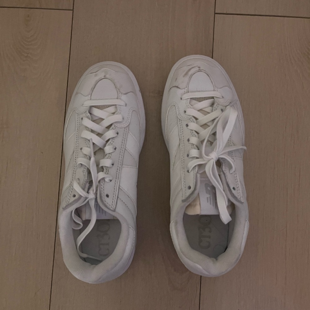 New Balance White Athletic Shoes with Low-Top Design